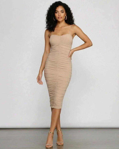 Solenne Midi Dress by SLIMONA, showcasing a sweetheart neckline and ruched bodycon silhouette, perfect for evening wear.