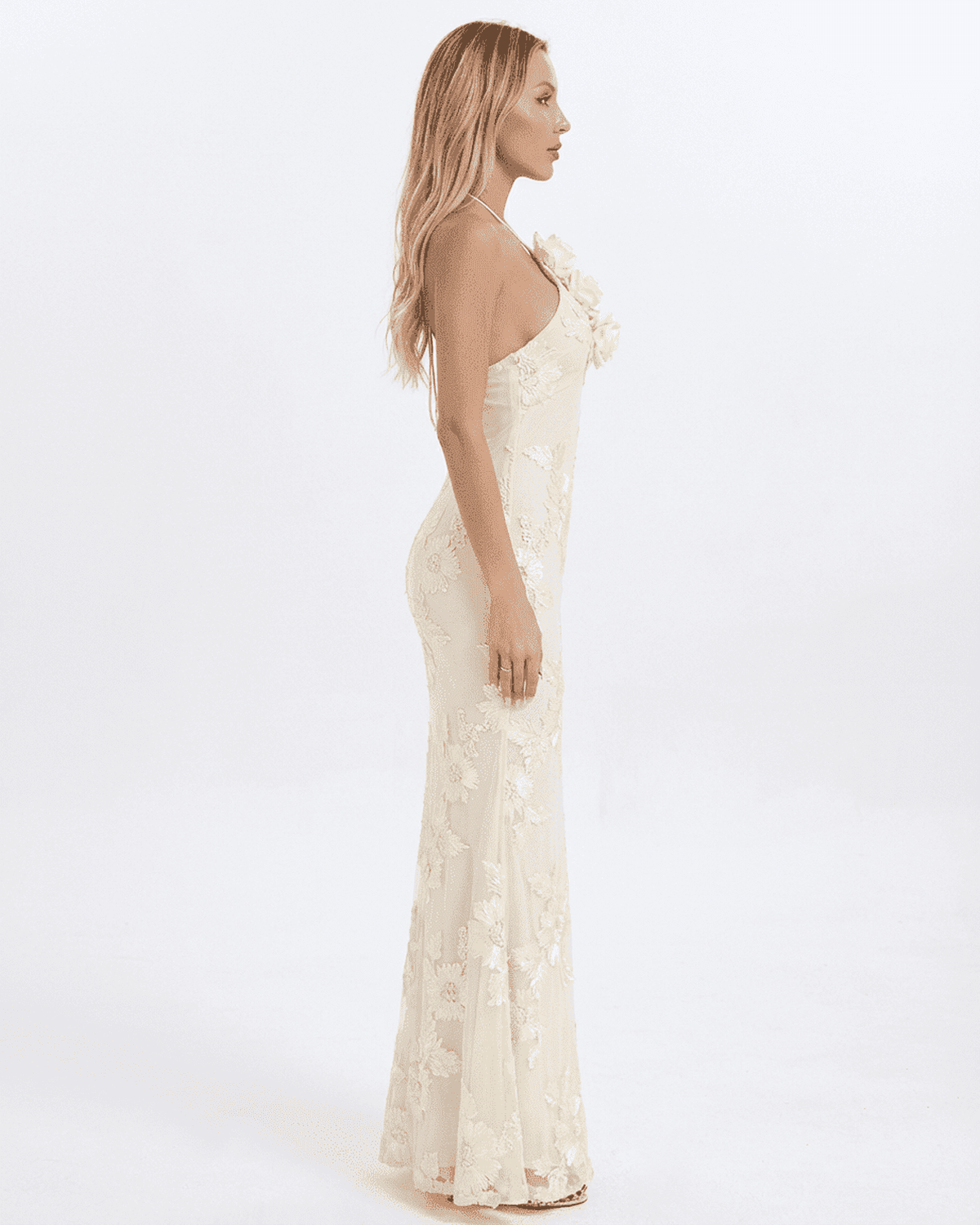 Valeria Maxi Dress by SLIMONA, showcasing a halter neck design with 3D floral foil print, elegant silhouette.