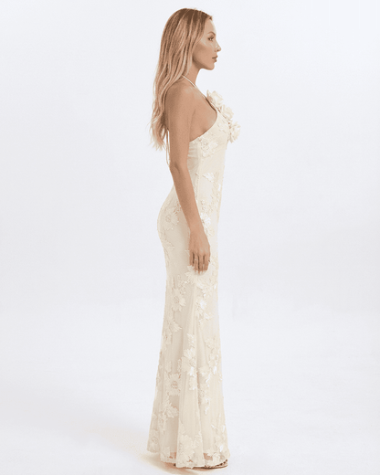 Valeria Maxi Dress by SLIMONA, showcasing a halter neck design with 3D floral foil print, elegant silhouette.