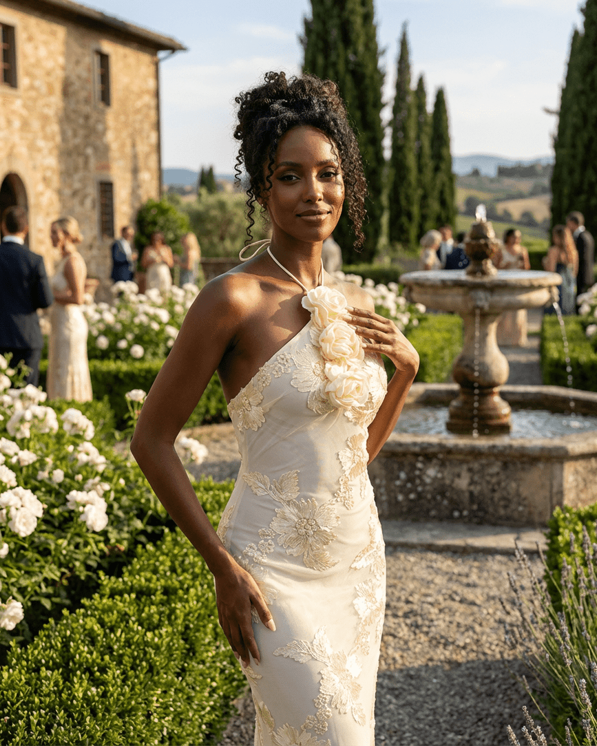 Elegant woman in Valeria Maxi Dress by SLIMONA, showcasing halter neck and 3D floral details in a garden setting.