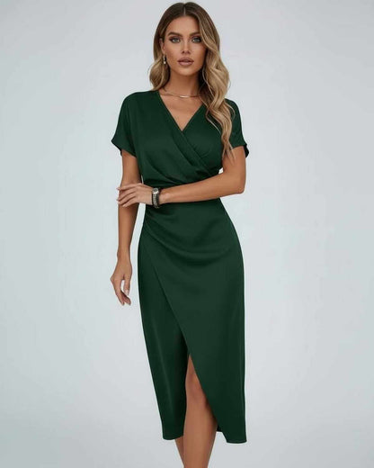 Vela Midi Dress by Lauven – Dark green elegant wrap dress featuring a V-neckline and soft flowing skirt.