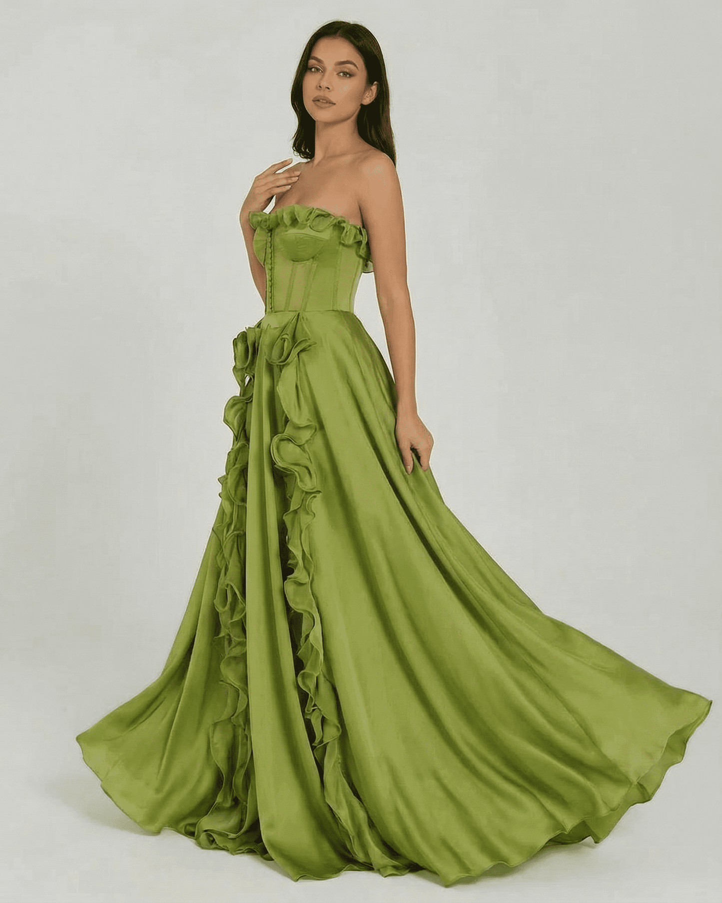 Elegant strapless Verdessa Maxi Dress by SLIMONA in green with ruffle detail and flowing silhouette.